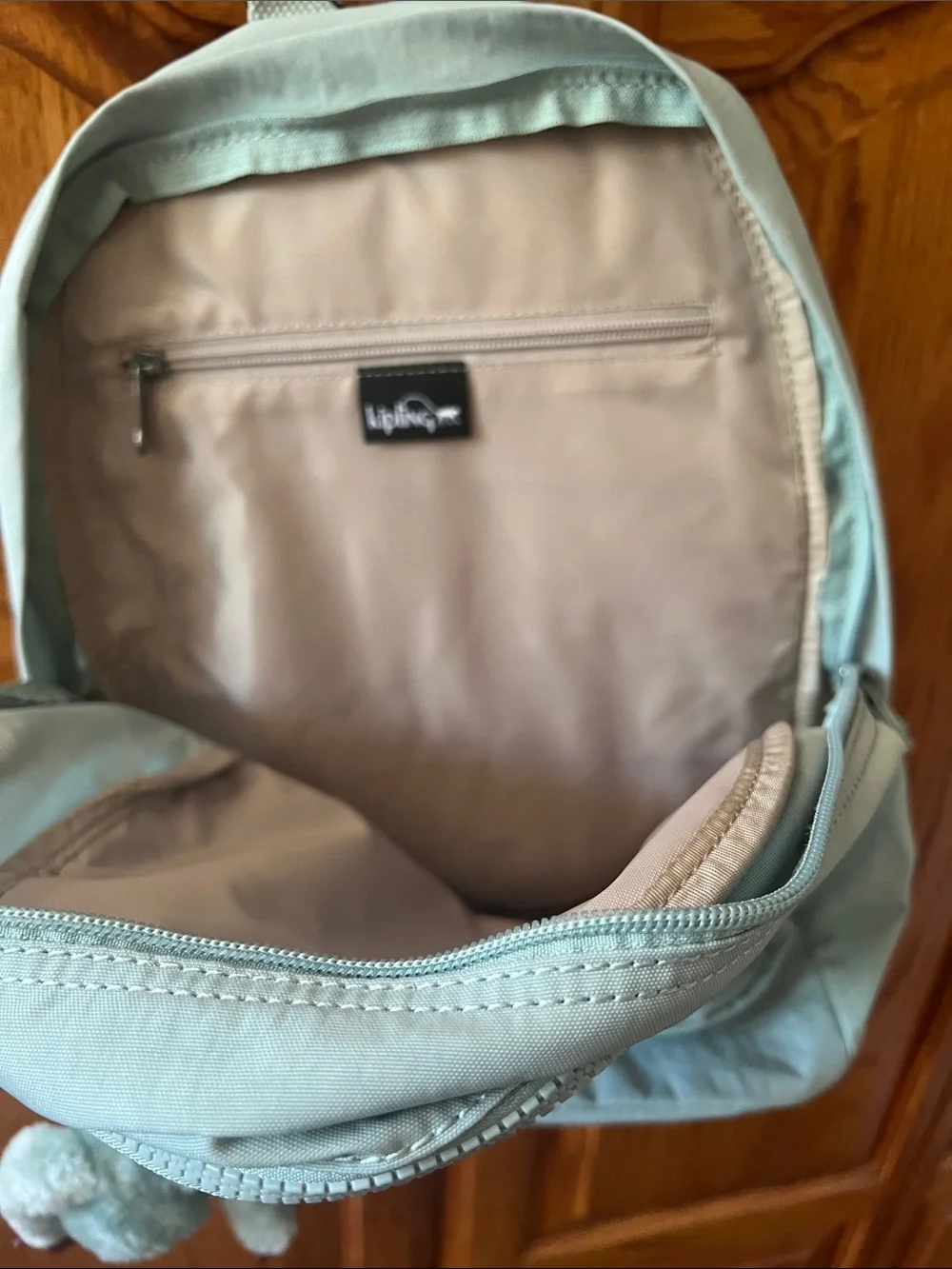 Kipling Light Blue  Backpack with Monkey Keychain
